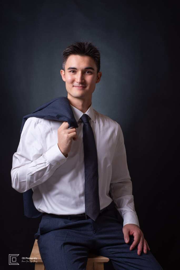 Corporate portrait in the studio of a man with a black background by Cristian Bucur, photographer in Bonifacio Global City  