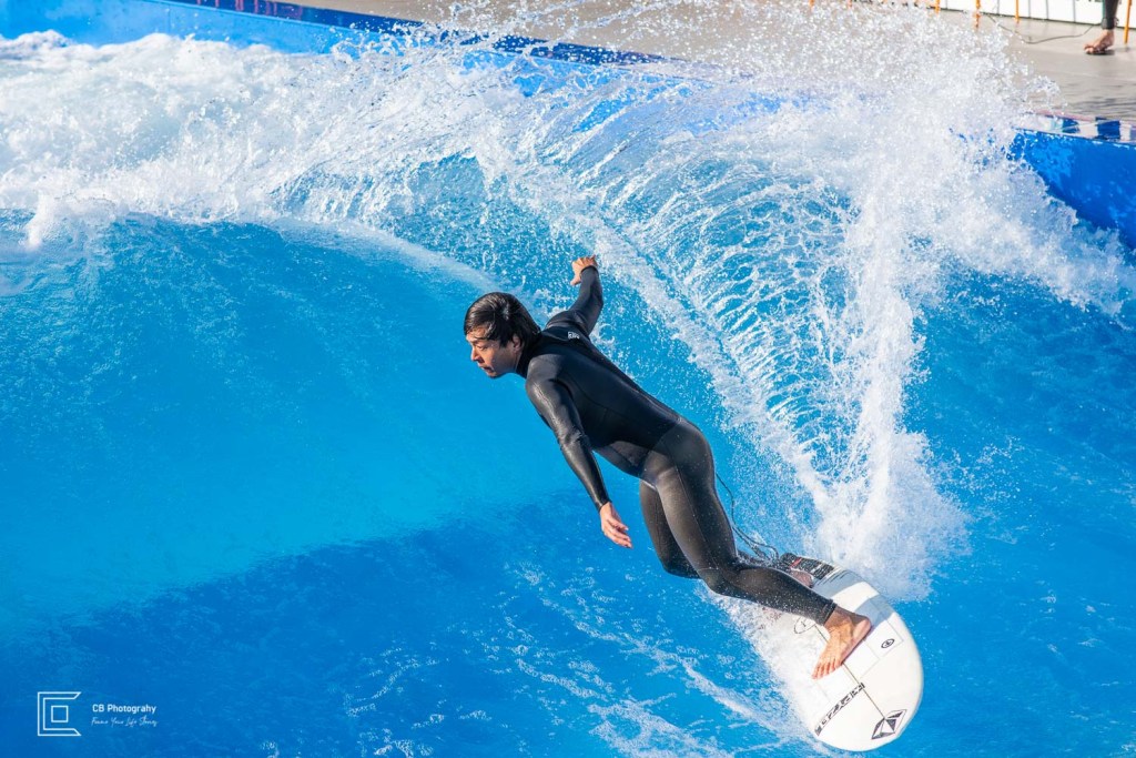 Surfer splashing waves 